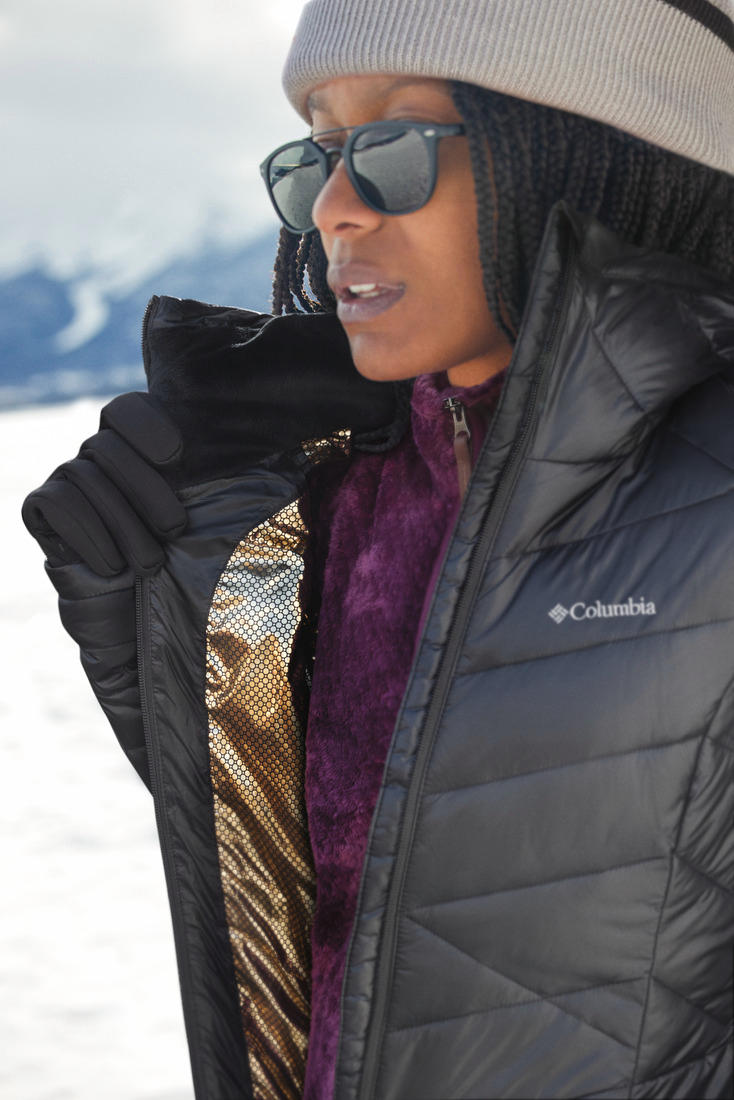 A Women Wearing Columbia Women Black Joy Peak Mid Jacket
