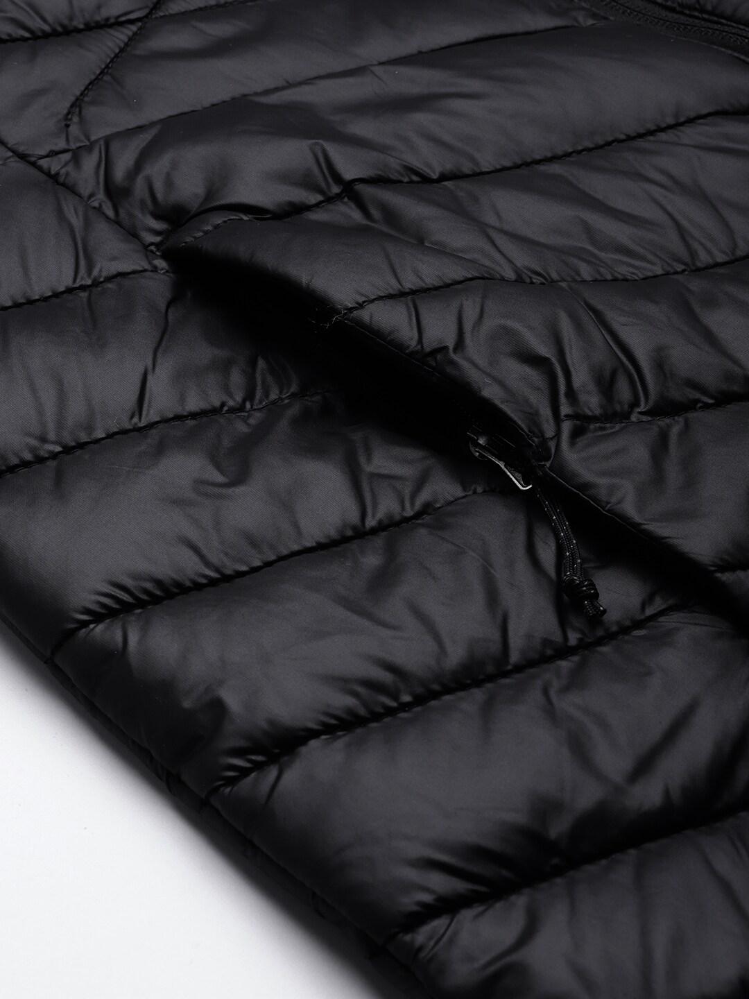 A Women Wearing Columbia Women Black Joy Peak Mid Jacket