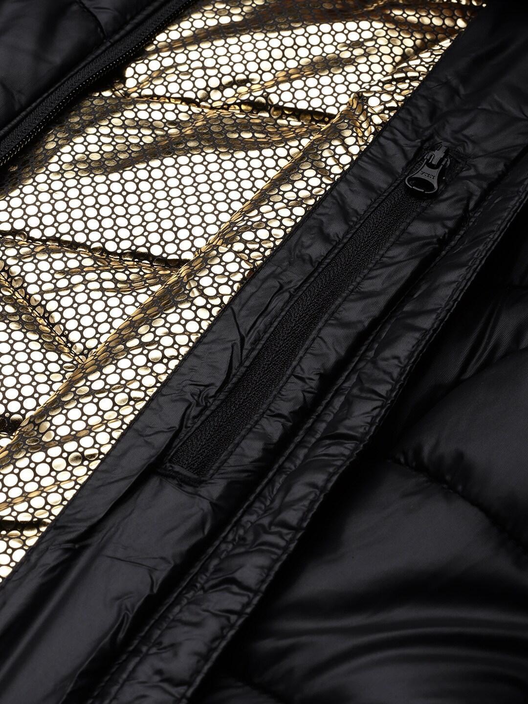 A Women Wearing Columbia Women Black Joy Peak Mid Jacket