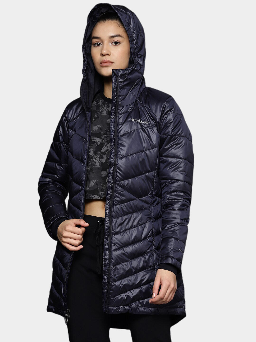 A Women Wearing Columbia Women Navy Blue Joy Peak Mid Jacket