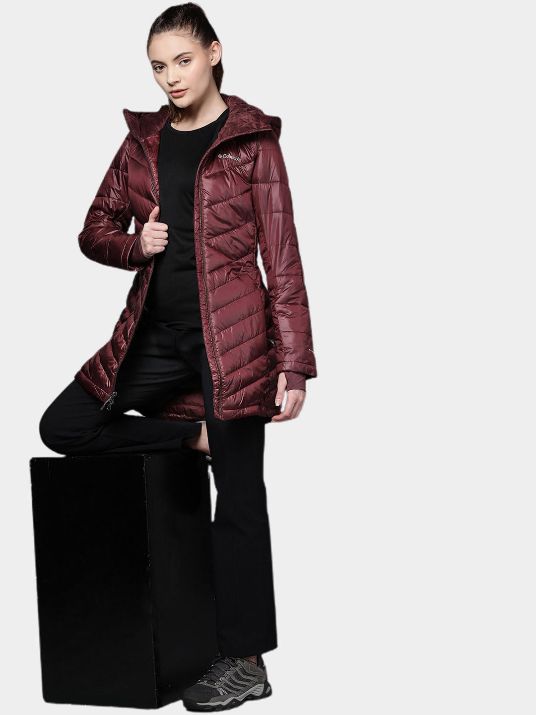 A Women Wearing Columbia Women Maroon Joy Peak Mid Jacket