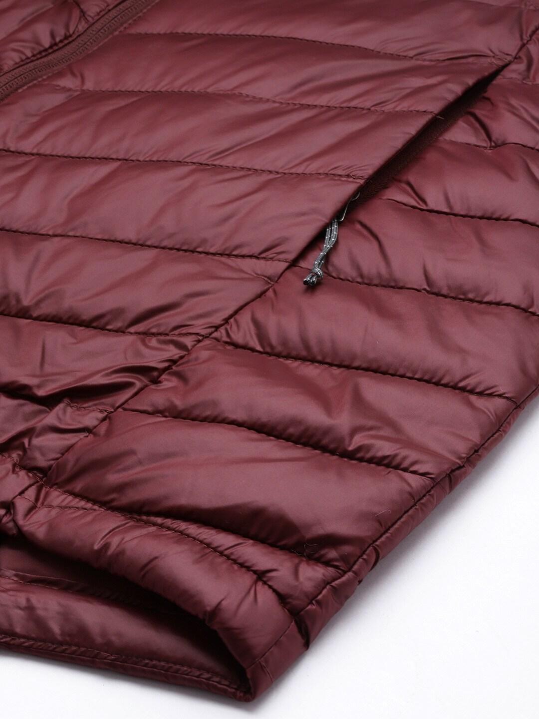 A Women Wearing Columbia Women Maroon Joy Peak Mid Jacket