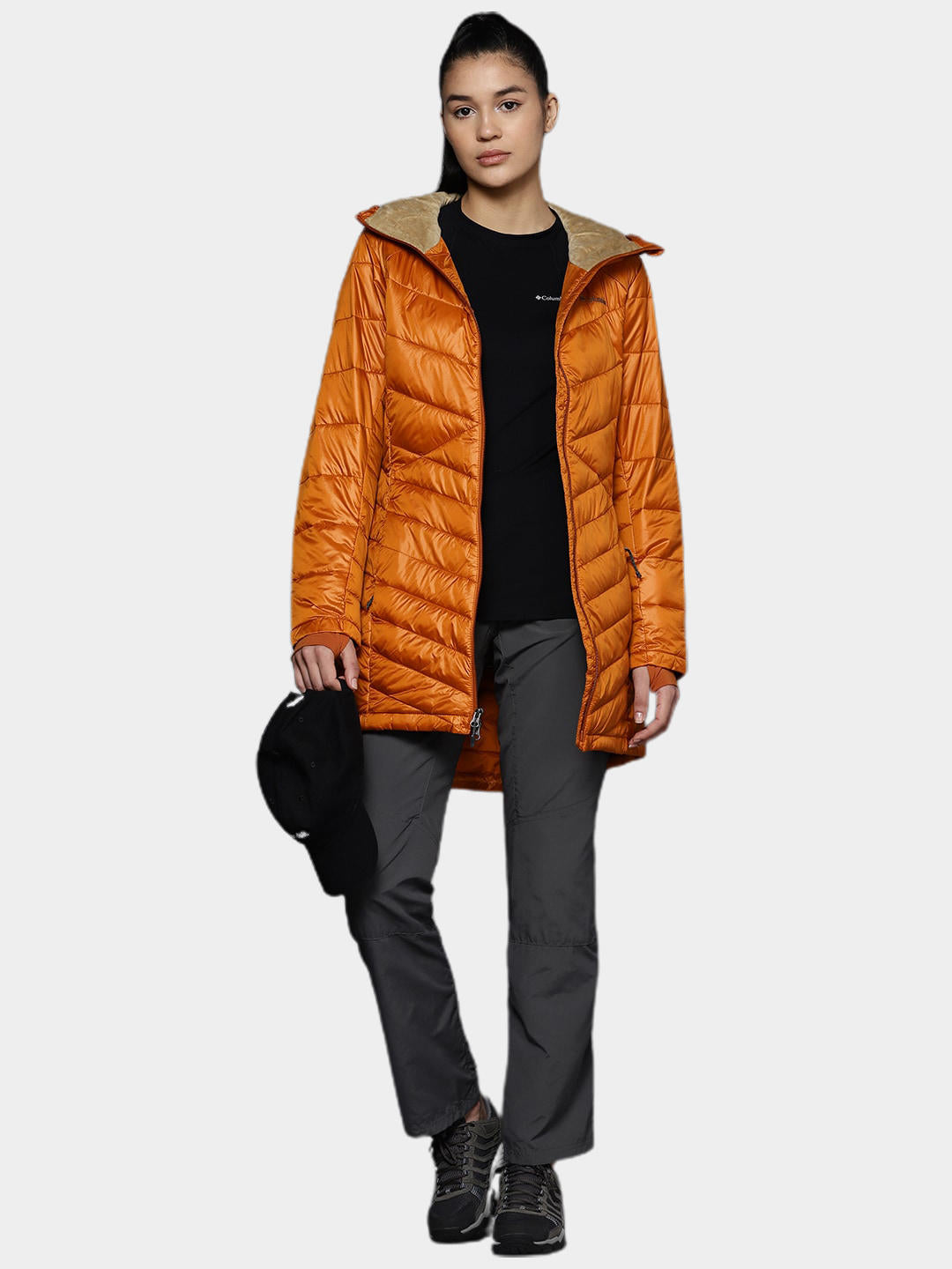 A Women Wearing Columbia Women Orange Joy Peak Mid Jacket
