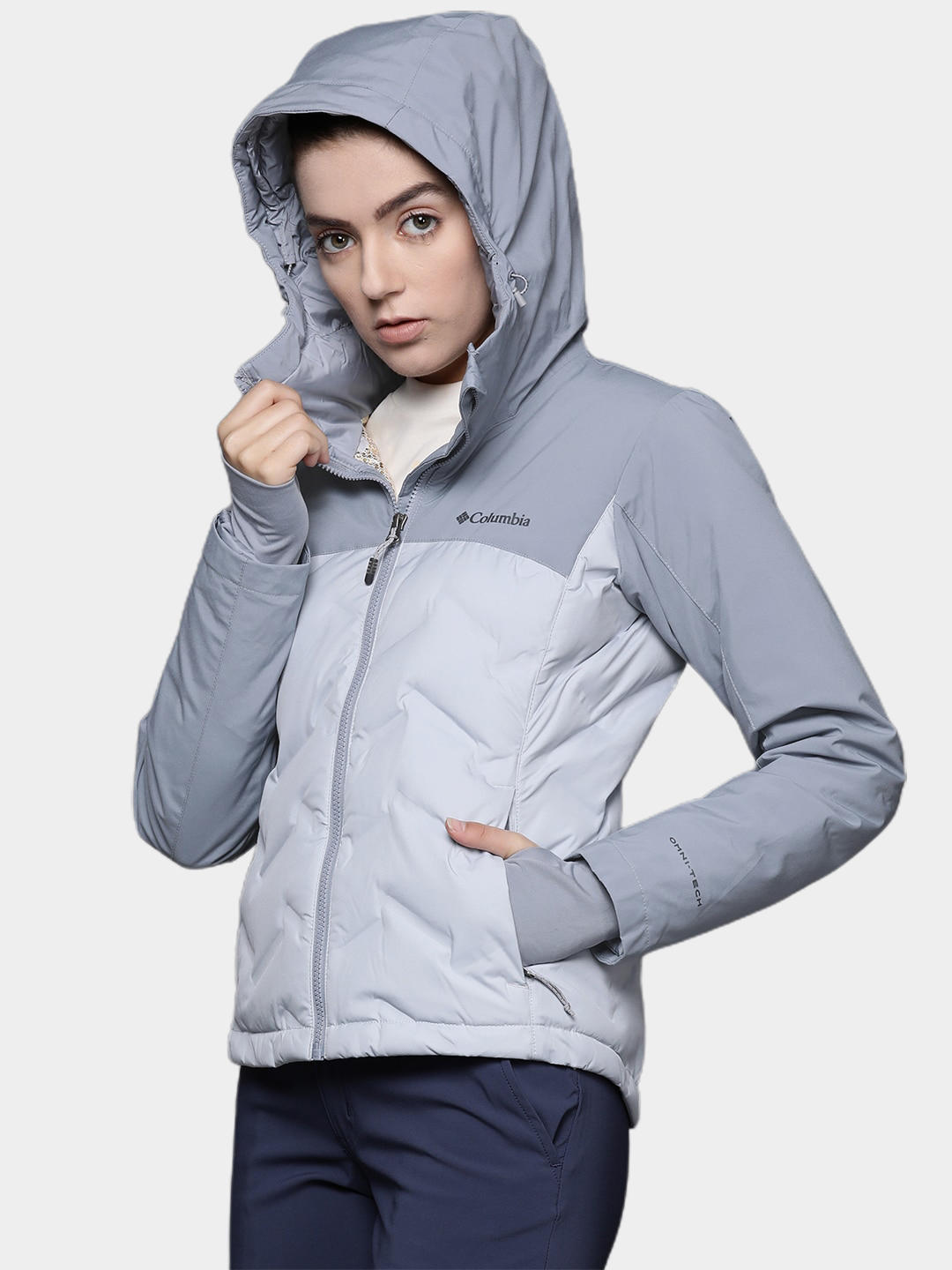 A Women Wearing Columbia Women Grey Grand Trek II Down Jacket