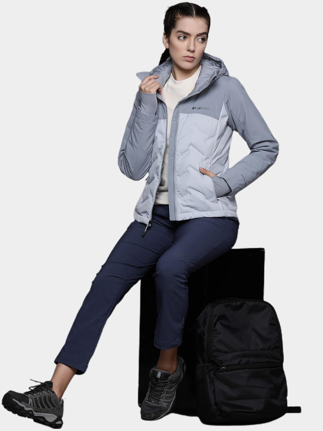 A Women Wearing Columbia Women Grey Grand Trek II Down Jacket