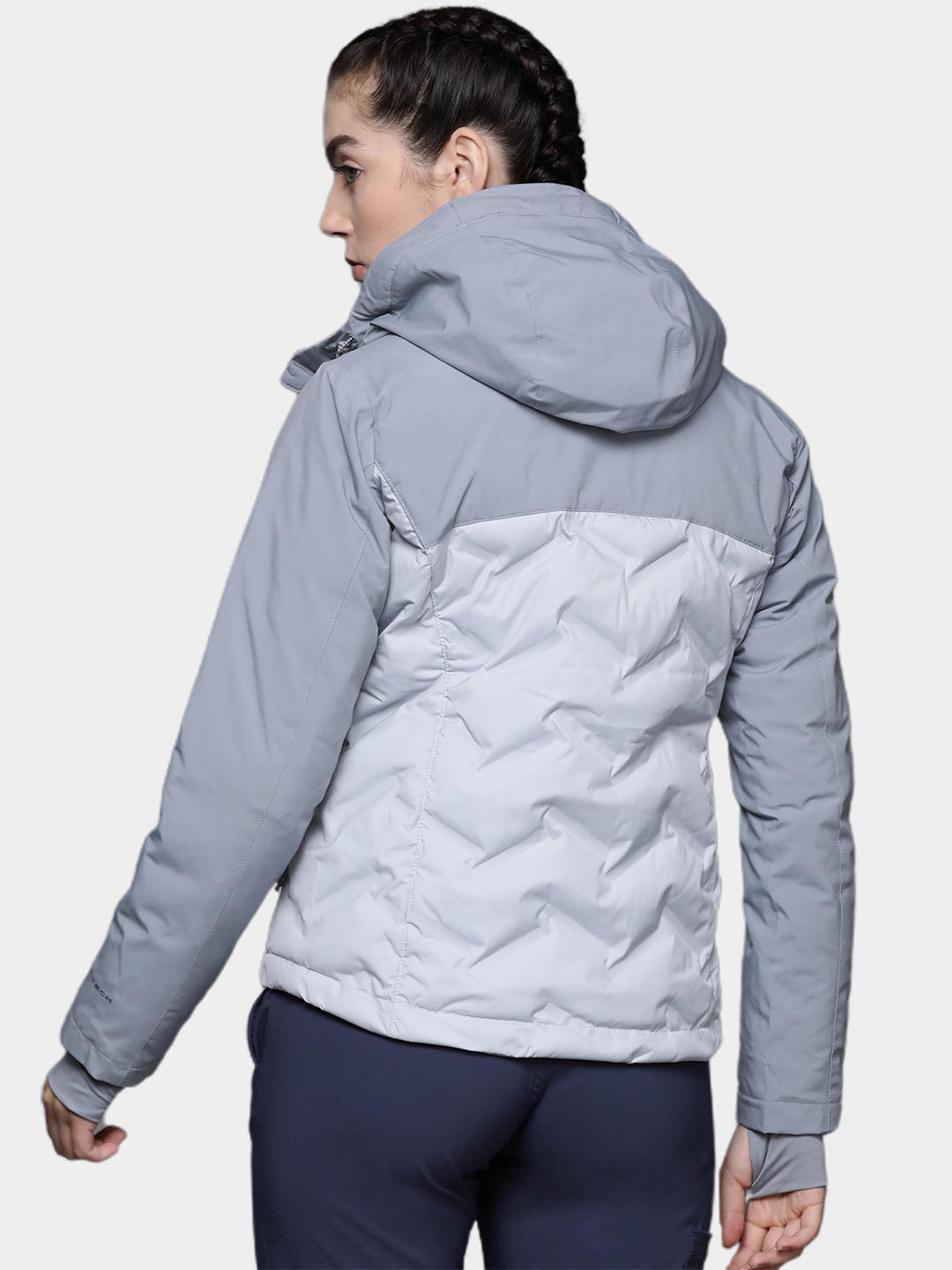 A Women Wearing Columbia Women Grey Grand Trek II Down Jacket