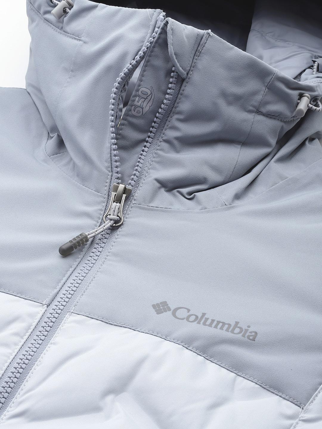A Women Wearing Columbia Women Grey Grand Trek II Down Jacket
