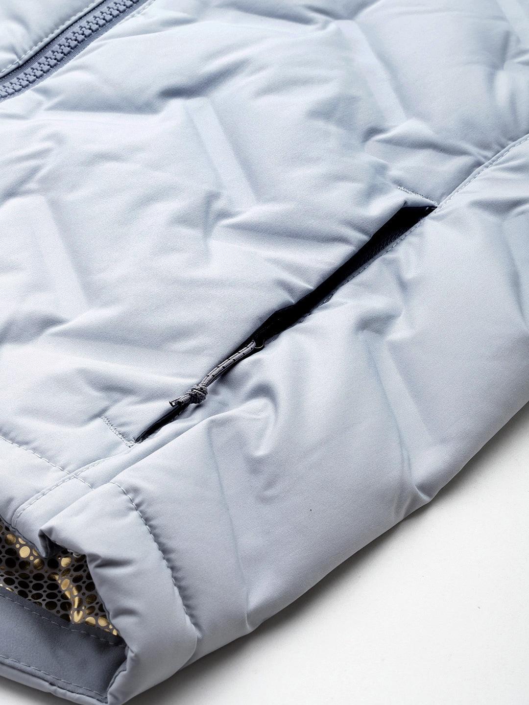 A Women Wearing Columbia Women Grey Grand Trek II Down Jacket