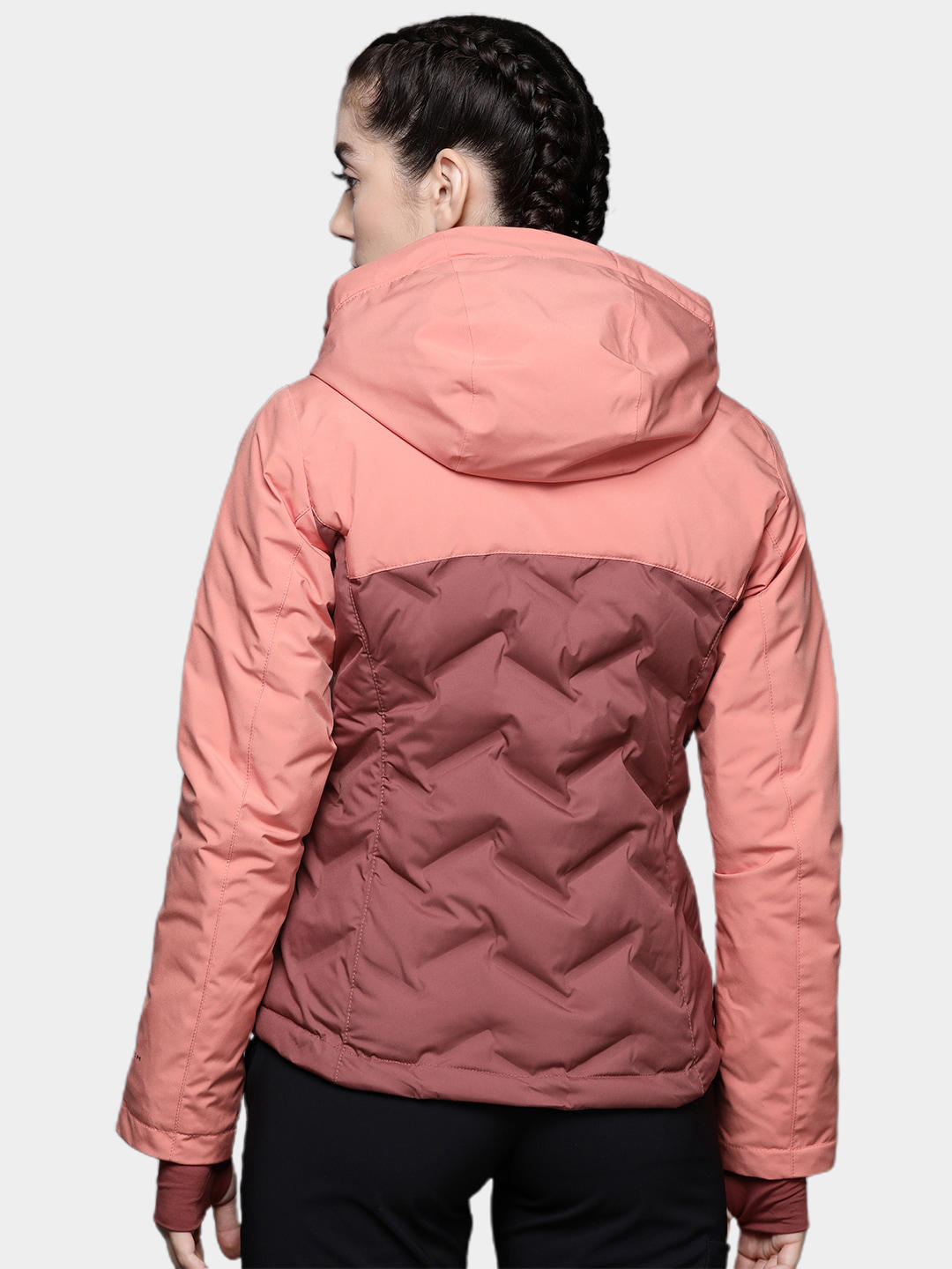 A Women Wearing Columbia Women Pink Grand Trek II Down Jacket
