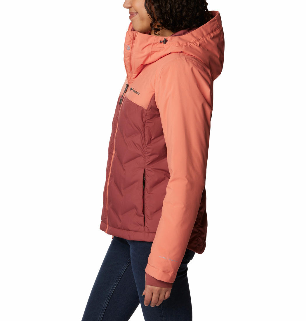 A Women Wearing Columbia Women Pink Grand Trek II Down Jacket