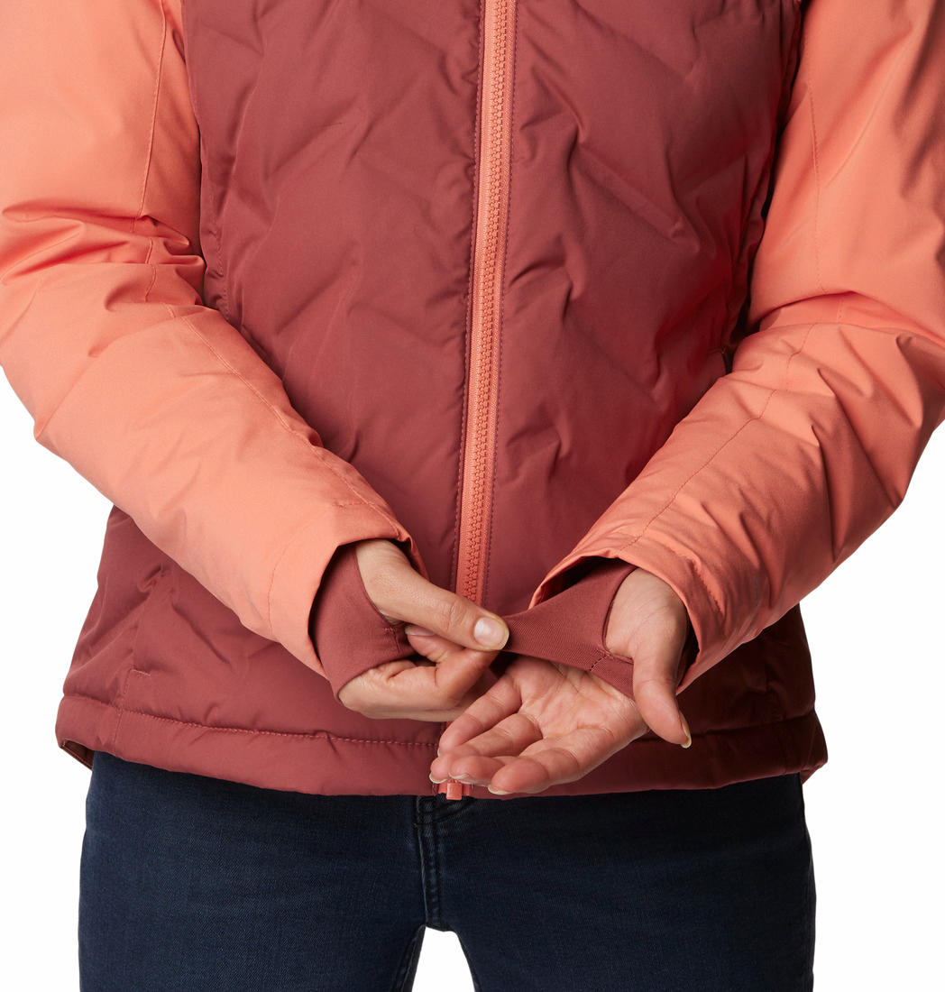 A Women Wearing Columbia Women Pink Grand Trek II Down Jacket
