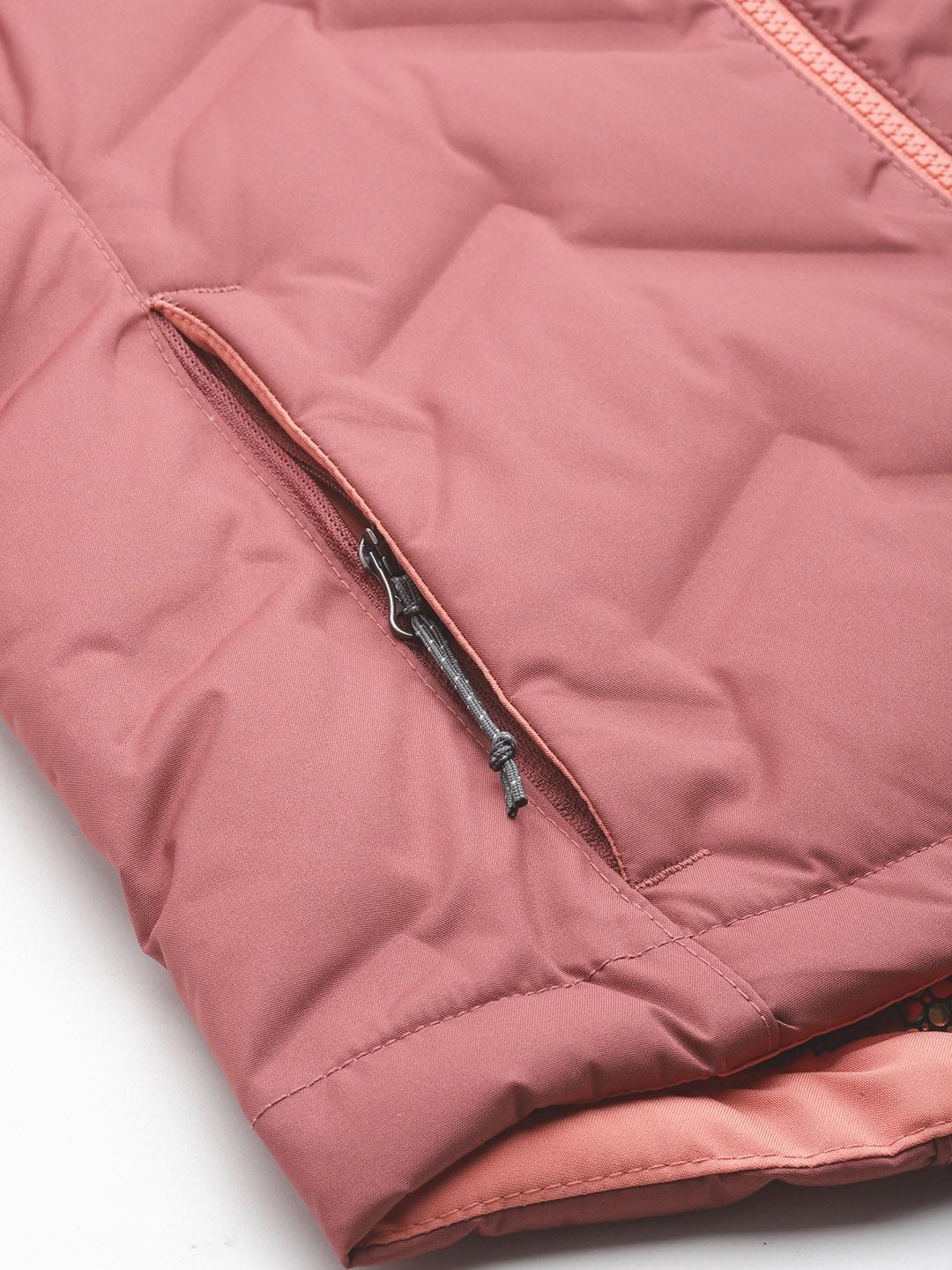 A Women Wearing Columbia Women Pink Grand Trek II Down Jacket