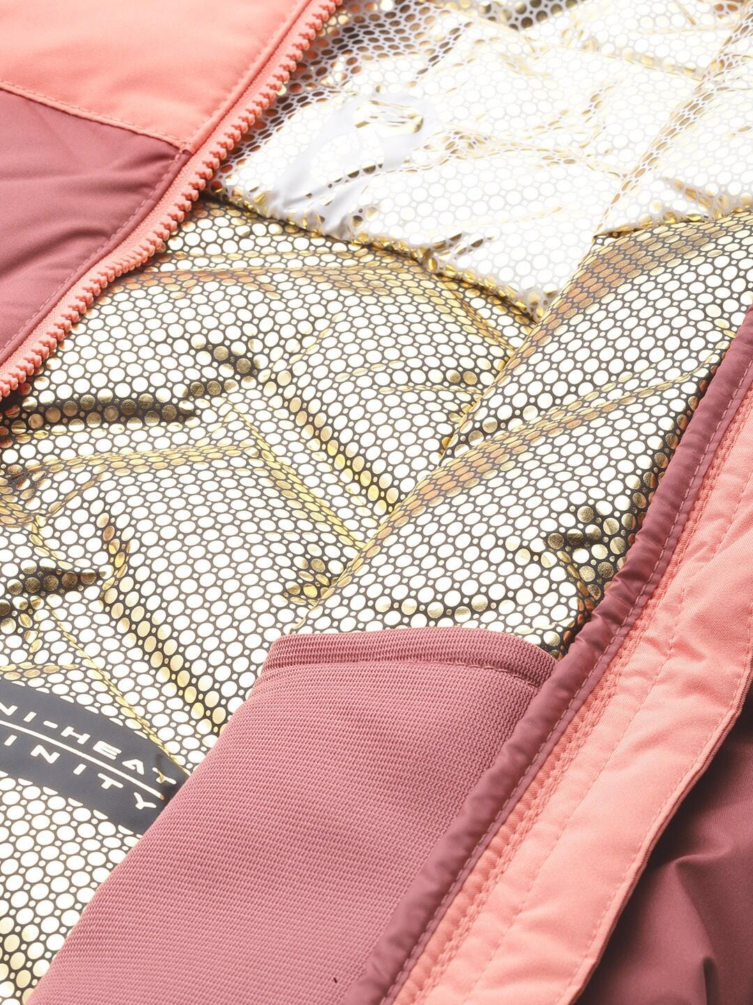 A Women Wearing Columbia Women Pink Grand Trek II Down Jacket