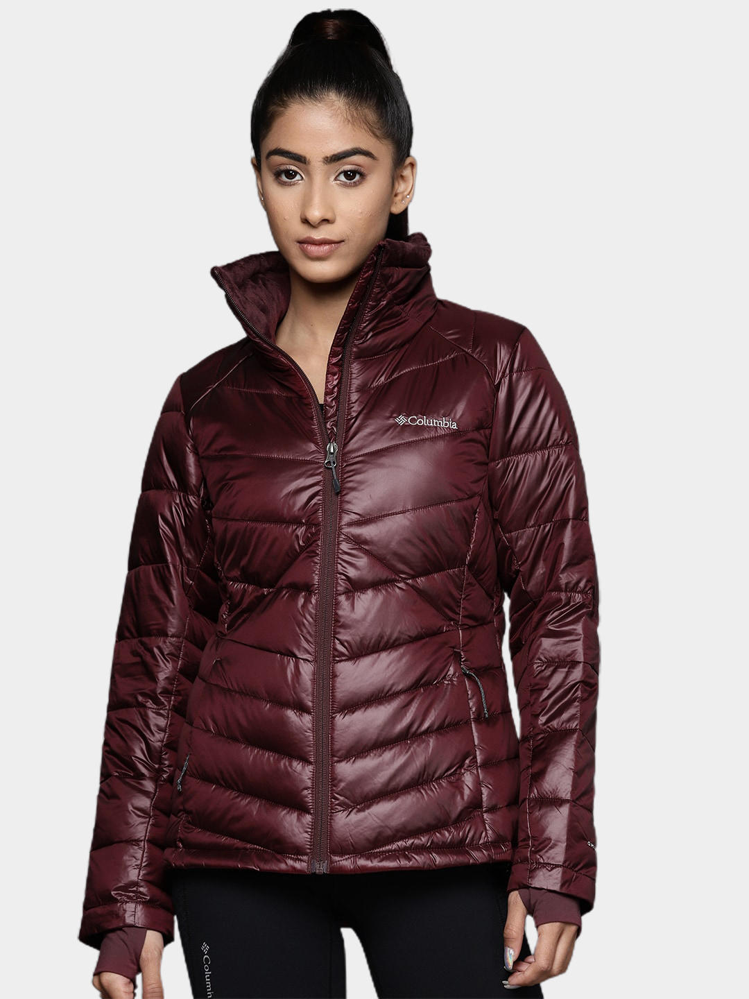A Women Wearing Columbia Women Maroon Joy Peak Jacket