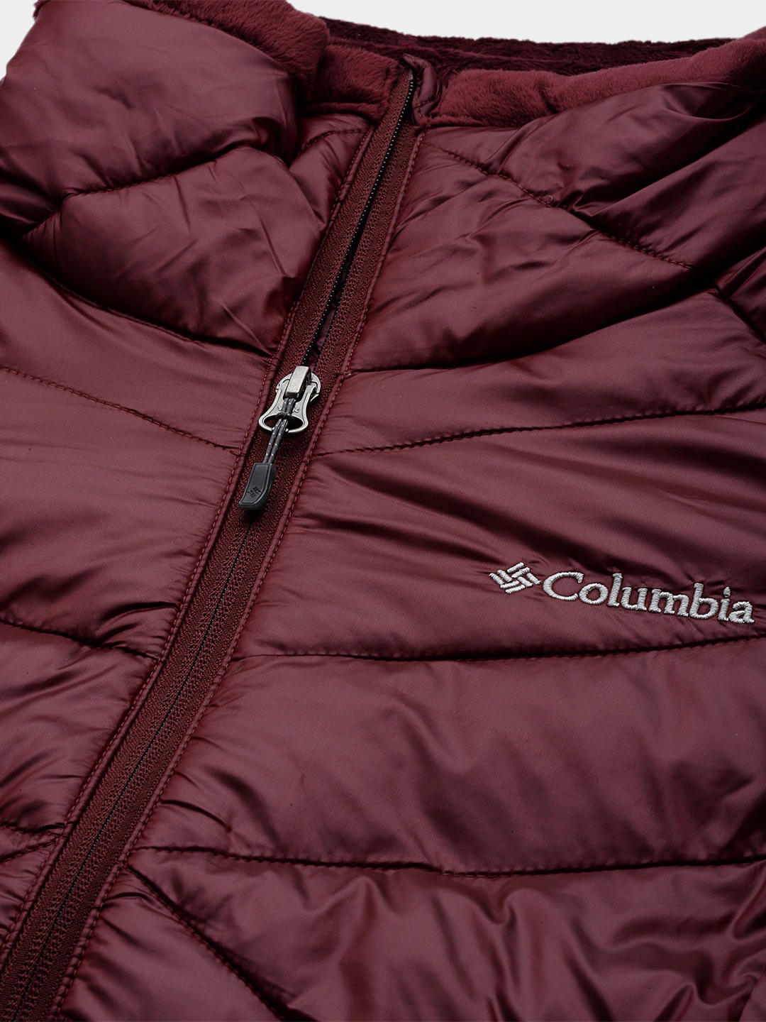 A Women Wearing Columbia Women Maroon Joy Peak Jacket