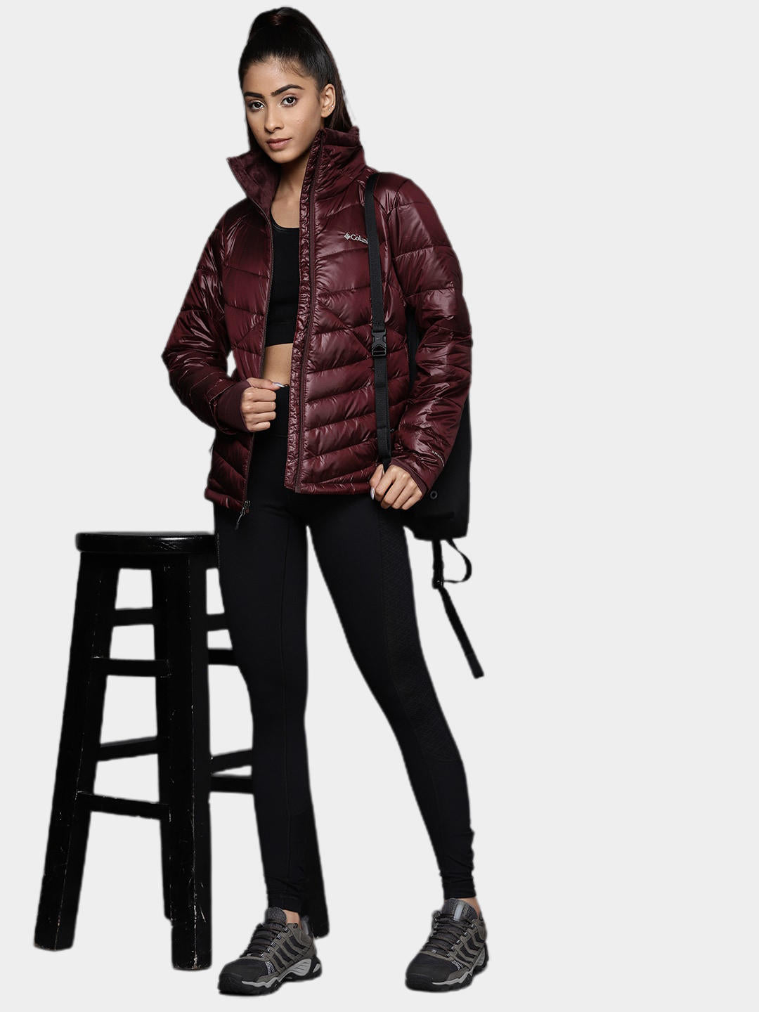 A Women Wearing Columbia Women Maroon Joy Peak Jacket