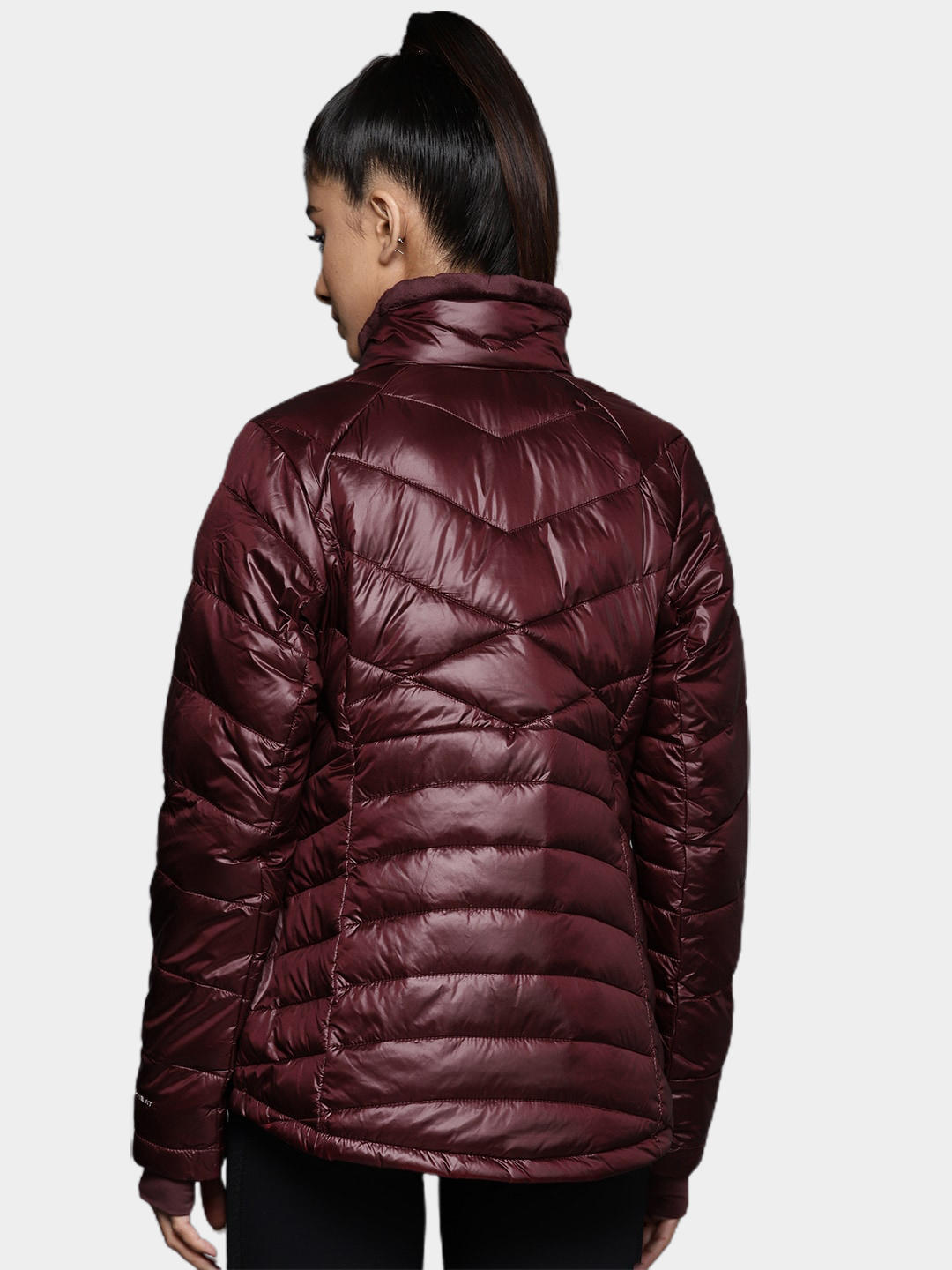 A Women Wearing Columbia Women Maroon Joy Peak Jacket