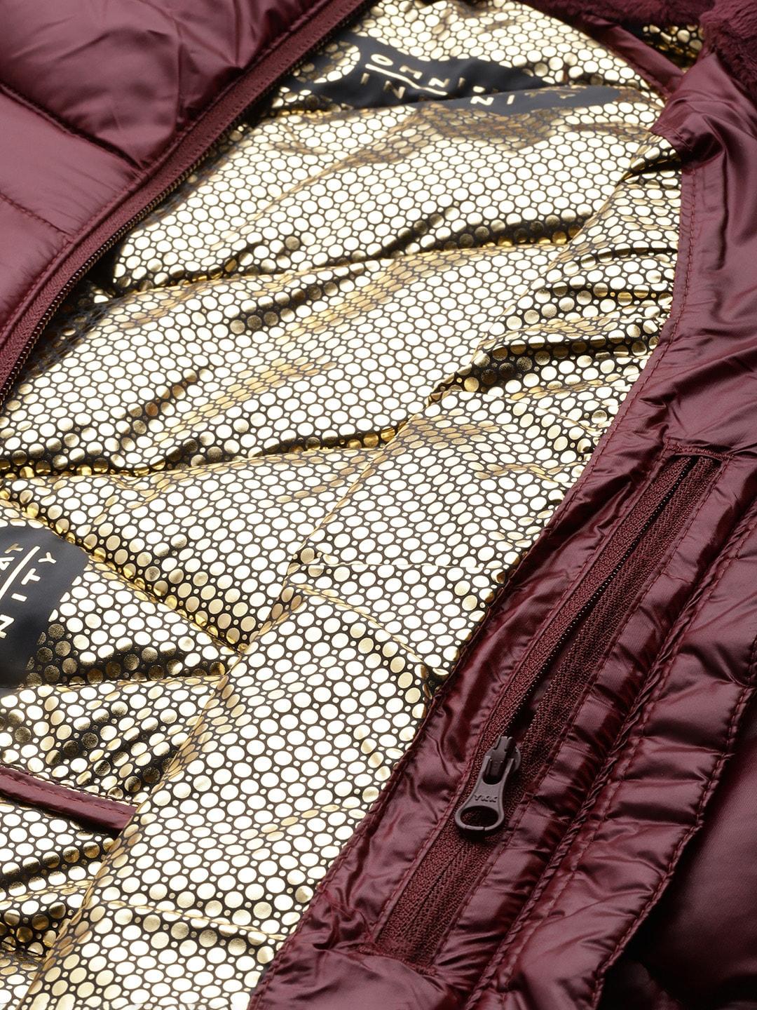 A Women Wearing Columbia Women Maroon Joy Peak Jacket