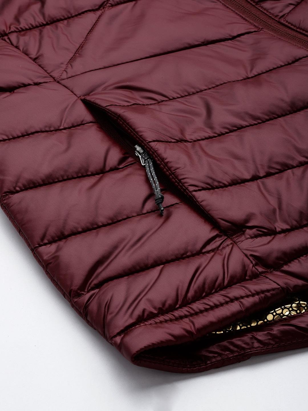 A Women Wearing Columbia Women Maroon Joy Peak Jacket