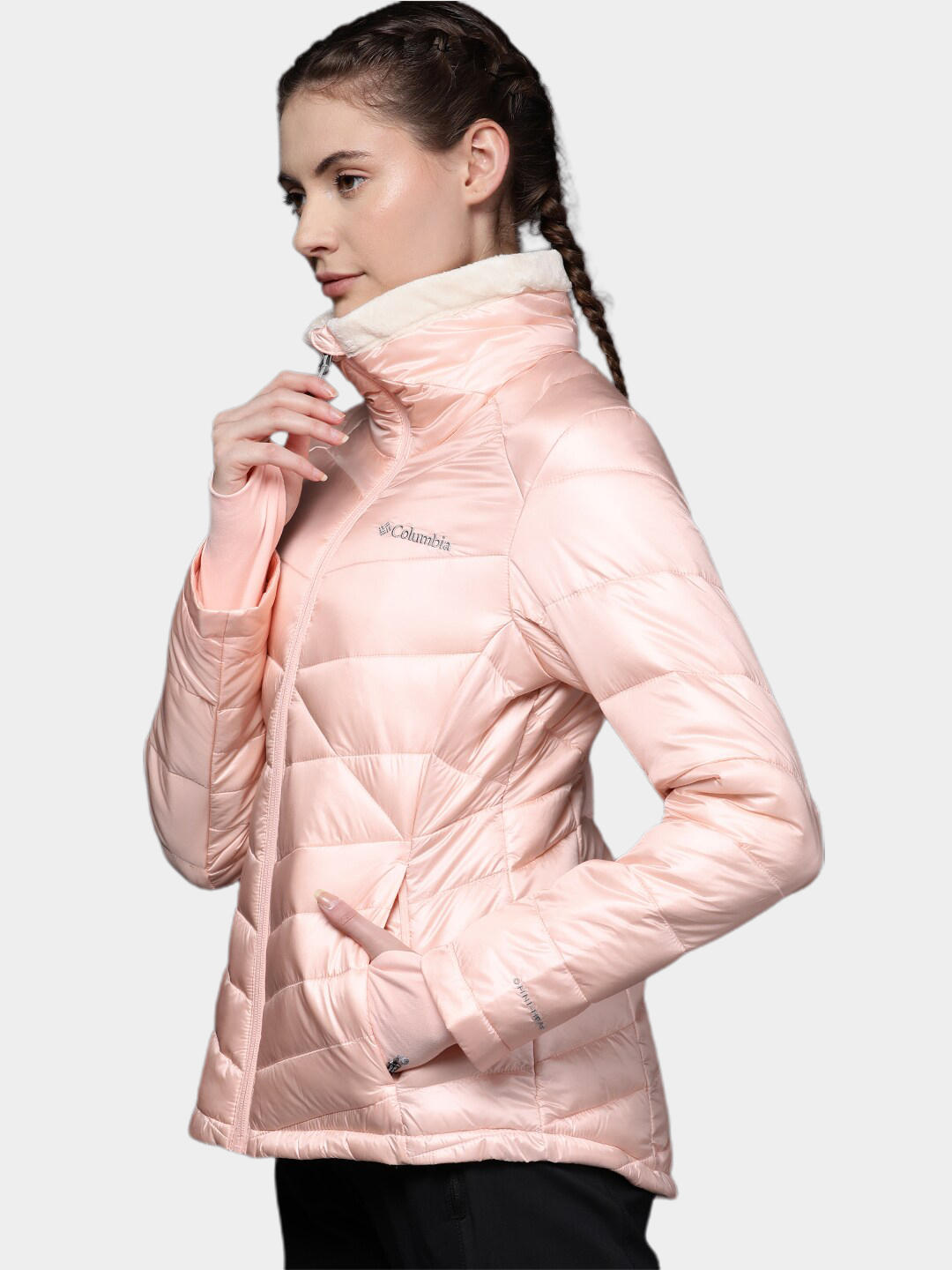 A Women Wearing Columbia Women Peach Joy Peak Jacket