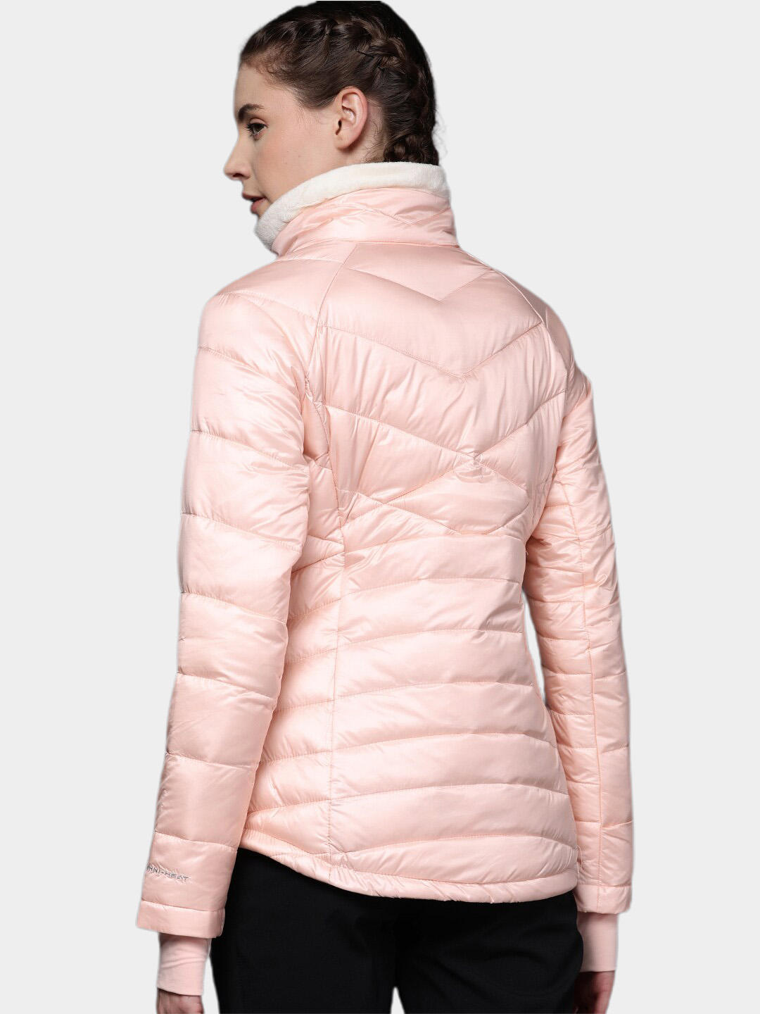 A Women Wearing Columbia Women Peach Joy Peak Jacket