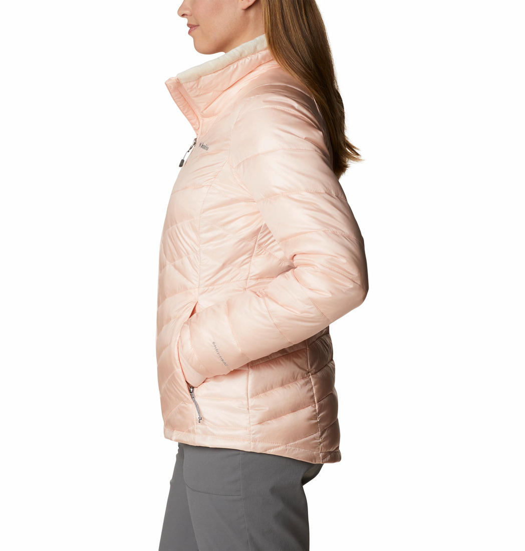 A Women Wearing Columbia Women Peach Joy Peak Jacket