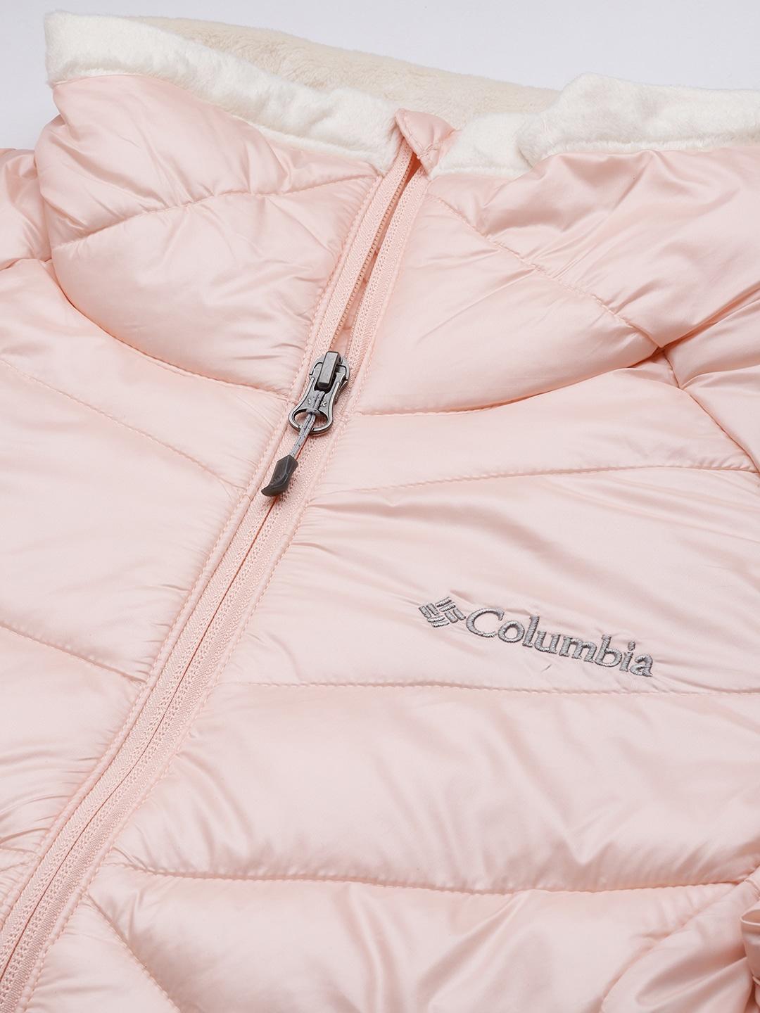 A Women Wearing Columbia Women Peach Joy Peak Jacket