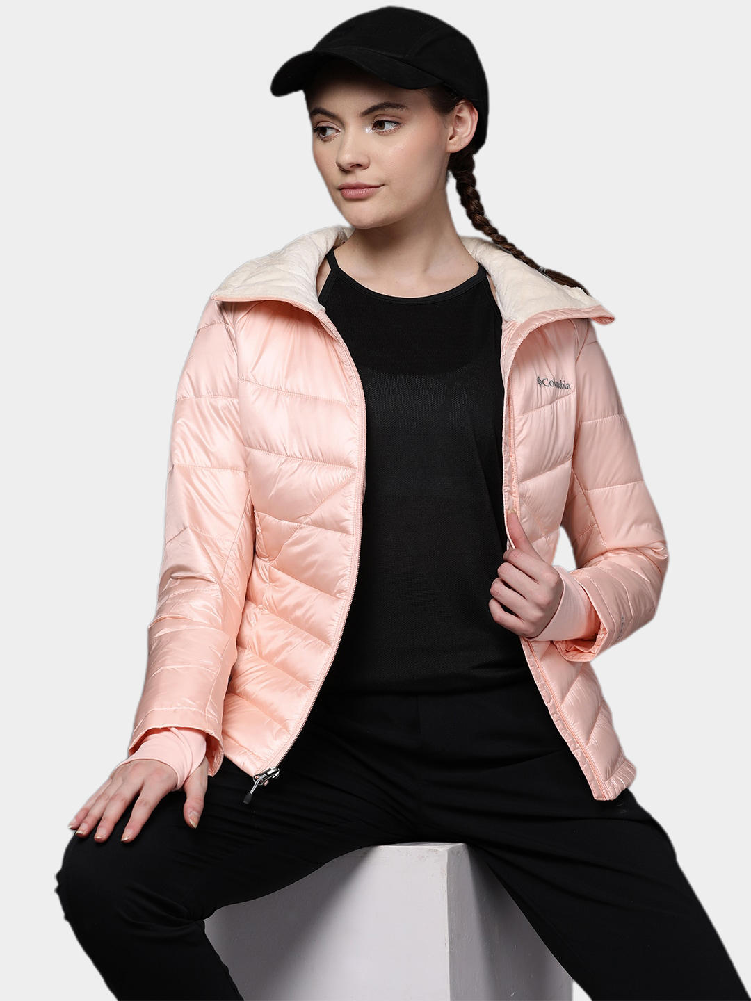 A Women Wearing Columbia Women Peach Joy Peak Jacket