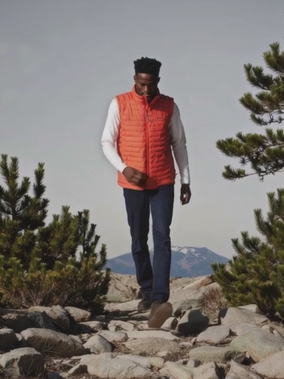 A Men Wearing Columbia Men Orange Silver Falls Vest